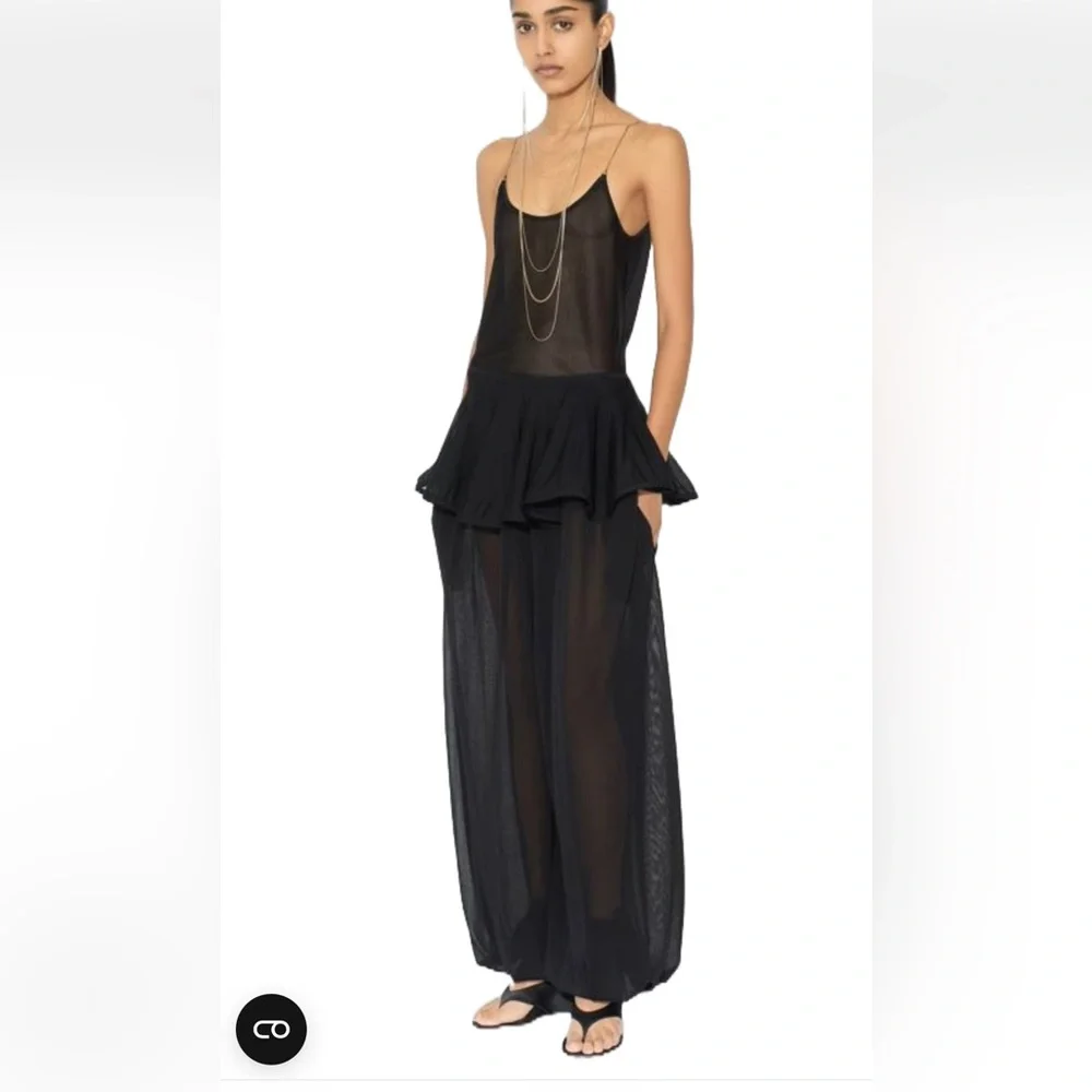 $3375 Alaia sheer peplum black balloon pants